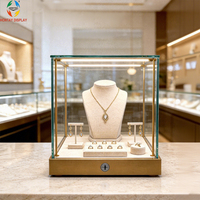 Comptoir de présentation de bijoux verrouillable sur mesure avec éclairage LED, base en métal doré, petite vitrine en verre pour bijouterie et showroom