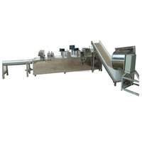 Ligne de production de barre d'énergie de processus de céréales pressées à froid Machine industrielle entièrement automatique de protéines d'arachide de bonbons avec revêtement