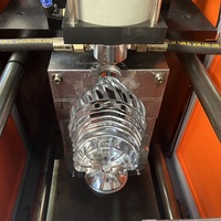 Machine de soufflage semi-automatique de bouteilles de 3 gallons Machine de fabrication de bouteilles en PET Prix Machine de moulage par soufflage Bouteille d'eau de 5 gallons