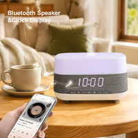 Diffuseur d'huile essentielle, haut-parleur d'horloge domestique diffuseur d'arôme humidificateur ultrasonique à brume froide avec fonction de lecteur de musique