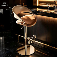Tabouret de bar de luxe en métal rose doré avec siège en cuir rembourré, hauteur réglable, pour bar et restaurant commercial