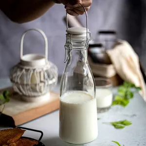 Botol swing top kaca fermentasi sekunder, bentuk kerucut bening 1liter dengan pegangan logam sumbat keramik