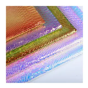 0.7-0.8MM Shiny Holographic Film Crocodile Embossed PU Leather For Clothing Decoration