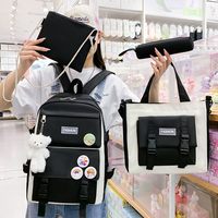 2025 Usine Offres Spéciales Volume High School Sac à dos. Ensemble de sac à dos et boîte à lunch pour enfants. Sac d'école