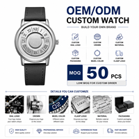 50 montres à quartz pour hommes OEM personnalisées avec logo sur cadran, modèle DOM 1345, à aiguille magnétique rotative, avec boule de fer défilante, design unique