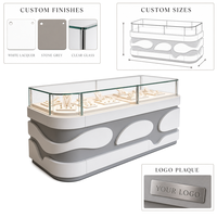 Vitrine de présentation de bijoux en verre incurvé LED minimaliste sur mesure, comptoir îlot pour bijouterie et salle d'exposition