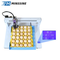 Nouvelle machine de codage d'œufs à jet d'encre entièrement automatique avec une vitesse d'impression de 40 ppm et une résolution de 600 dpi pour l'impression de la date sur les œufs de volaille