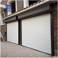 Porte à enroulement en aluminium prix usine, porte industrielle extérieure isolée, résistante au vent et antivol pour entrepôt