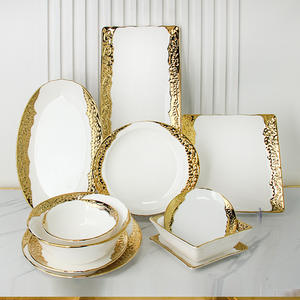 Juego de <span class=keywords><strong>vajilla</strong></span> de porcelana Phnom Penh Royal White, <span class=keywords><strong>vajilla</strong></span> de cerámica en relieve con borde dorado para platos de cena de boda y juego de cuencos - Product Image 1