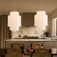 Lampe suspendue Jules en verre laiteux à étages en laiton antique moderne Simig Lighting