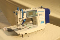 TOUCH LCD Machine à coudre à point noué toutes fonctions Configuration industrielle automatique à plat État neuf et utilisé disponible