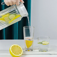 Carafe à eau en plastique PC moderne et écologique de 1100 ml avec poignée et couvercle pour boissons glacées