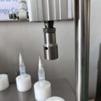 Machine de dosage et de bouchage automatique de flacons pour laboratoire médical hospitalier