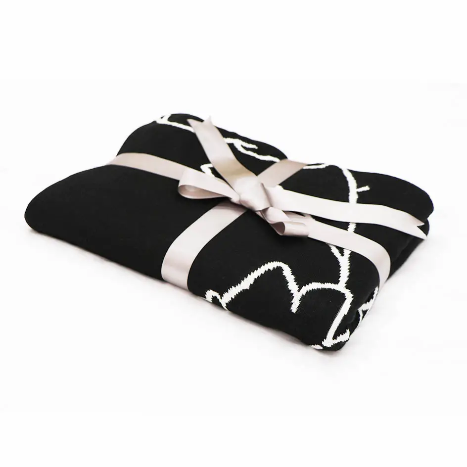 Lussuosa coperta di raffreddamento in maglia floreale di bambù in bianco e nero personalizzato lancio riscaldato per elegante Comfort letto inverno neonato