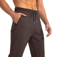 Pantalon de sport pour homme, logo personnalisé, performance, évacuation de l'humidité, coupe ajustée, entraînement en salle, respirant, séchage rapide, haute qualité, ODM