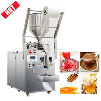 Petite machine d'emballage automatique de sauces pour sceller et emballer des sachets en plastique de beurre de cacahuète, d'eau et de miel