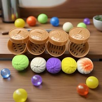 Jouet anti-stress coloré en forme de chignon avec mini étui vapeur, idéal pour les cadeaux de fête, les jeux sensoriels pour enfants et les cadeaux promotionnels.