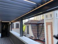 Pergola bioclimatique à toit rétractable électrique, abri solaire en profilés aluminium, prix usine