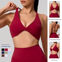 Soutien-gorge de sport pour femme à col en V profond torsadé, bretelles croisées au dos, coussinets amovibles, idéal pour le yoga et le Pilates