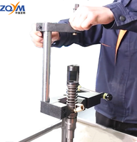 ZQYM ventes directes d'usine outil de réparation d'injecteur à rampe commune outil de retrait d'injection universel support de démontage d'injecteur