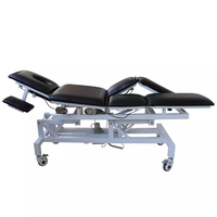 Table de massage électrique moderne réglable en gros avec 4 moteurs, lit de beauté et table de traitement chiropratique pour usage commercial
