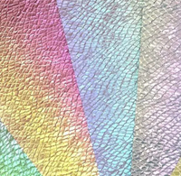 Vente en gros de cuir iridescent laser sept couleurs en stock, envoi de cuir résistant aux rayures de 1,0 mm d'épaisseur, emballage de meubles en cuir
