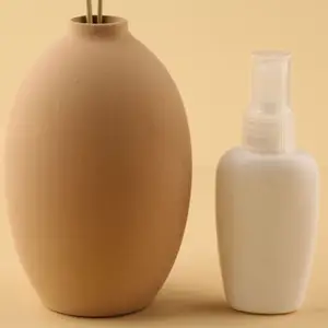50 ml flüssigkeits-sprühflasche aus kunststoff ovale sprühflasche flüssigkeitsspenderflasche