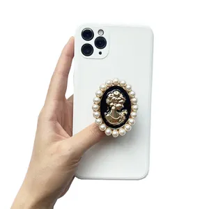 Ins Creative Retro Mobile Phone Holder Luxury Pearl Beauty Head Lazy Person Retractable Grip Phone Socket