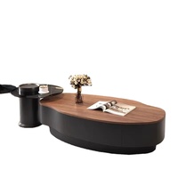 Table basse ovale moderne haut de gamme couleur noyer avec un design luxueux et serein, idéale pour un salon