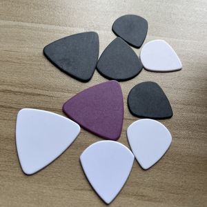 ปิ๊กกีตาร์พลาสติกเดลรินคุณภาพสูง 100 ชิ้น ไม่มีโลโก้ รุ่น <span class=keywords><strong>JAZZ</strong></span> <span class=keywords><strong>III</strong></span> & <span class=keywords><strong>JAZZ</strong></span> XL รูปทรงสามเหลี่ยม ปลายแหลม ผิวด้าน - Product Image 4