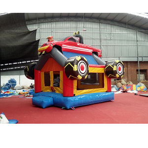 Château gonflable Monster Truck Rally avec roues jaunes vives et toboggan bleu pour les fêtes d'enfants en plein air et les divertissements en parc - Product Image 3