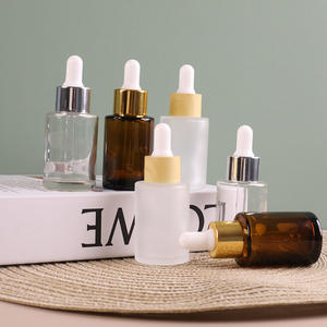 Venta al por mayor 30ml botella de vidrio de aceite esencial de hombro plano transparente esmerilado <span class=keywords><strong>precio</strong></span> competitivo cartón de sellado de tapa de rosca de estilo marrón - Product Image 1