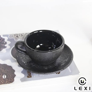 Ensemble tasse et soucoupe à café en céramique noire mate de luxe avec glaçure texturée effet lune, parfait pour la présentation d'espresso ou de latte art - Product Image 3