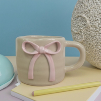 Tasse en céramique émaillée personnalisée avec nœud papillon en relief tasse de décoration quotidienne en porcelaine objets de décoration pour la maison