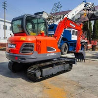 Vente Flash : Excavatrice sur chenilles d'occasion Doosan DX55, 5,5 tonnes, système hydraulique complet, bon état, livraison rapide, expédition mondiale