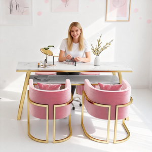Table de manucure et pédicure avec plateau en marbre blanc, pieds en métal doré, étagère de rangement et fauteuils confortables en velours - Product Image 1