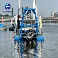 Bateau de dragage ETERNE pour le nettoyage des réservoirs et des fosses de petits volumes, alimenté par un moteur diesel
