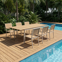 Ensemble de table à manger d'extérieur moderne SERWALL en HDPE imperméable, 7 pièces avec trou pour parasol et 6 chaises, gris