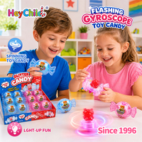 Bonbons en gros personnalisés sous marque privée, bonbons gyroscope LED clignotants en vrac, couleurs bleu rose, snacks interactifs pour la vente au détail