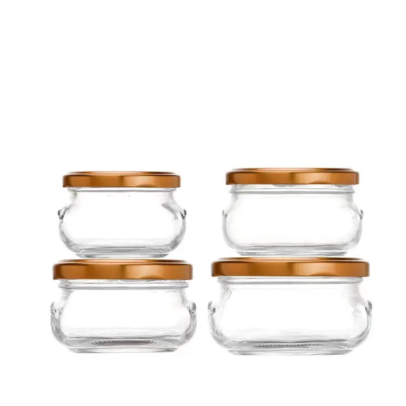 Nouveau design de qualité alimentaire vide en verre clair nid d'oiseau bouteille pot de confiture de miel avec couvercle 80ml 100ml 150ml 200ml