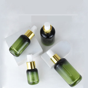 Flacon compte-gouttes à bouton-poussoir dégradé de luxe à baril rond fond épais 30ml huile essentielle 4 oz flacon compte-gouttes en verre vert 100ml - Product Image 2