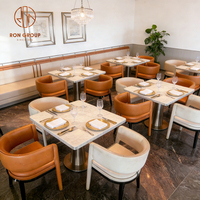 Canapé en cuir de luxe moderne, chaise rembourrée, base en acier inoxydable, ensemble de table en marbre pour café, restaurants, hôtel, steak-house