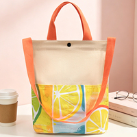 Sac fourre-tout en toile robuste et durable avec poche avant et bouton-pression pour des courses écologiques, des vacances d'été et des voyages