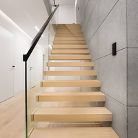 Escalier mural flottant en bois massif avec marches LED 110V et garde-corps en verre, populaire sur CBMmart aux États-Unis