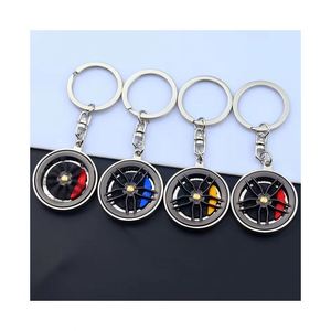 Metal Hub Rotating Keychain Creative Handle Play Turntable Keychain Pendant Red Blue Yellow Caliper Brake Disc Gift - Product Image 1