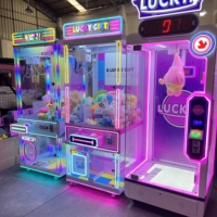 Machine à griffes à monnayeur, prix d'usine en gros, équipement de jeu d'arcade avec design coloré
