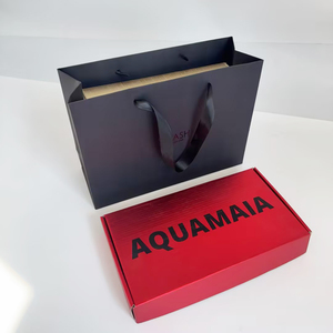 Bolsas de papel negro de lujo al por mayor, bolsas de regalo con asa de cinta de satén negra y logotipo UV personalizado para ropa, ropa interior y boutiques. - Product Image 6