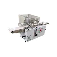Machine à trancher les biscuits et la pâte à biscuits aux canneberges