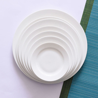 Prix bas en vrac Table de salle à manger classique Assiettes en céramique de restaurant en porcelaine ronde blanche