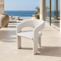 Moderner Luxus-Esszimmerstuhl aus Creme-Bouclé, nordischer geschwungener Sessel, gepolsterter Outdoor-Akzentstuhl für Villa, Resort, Hotel